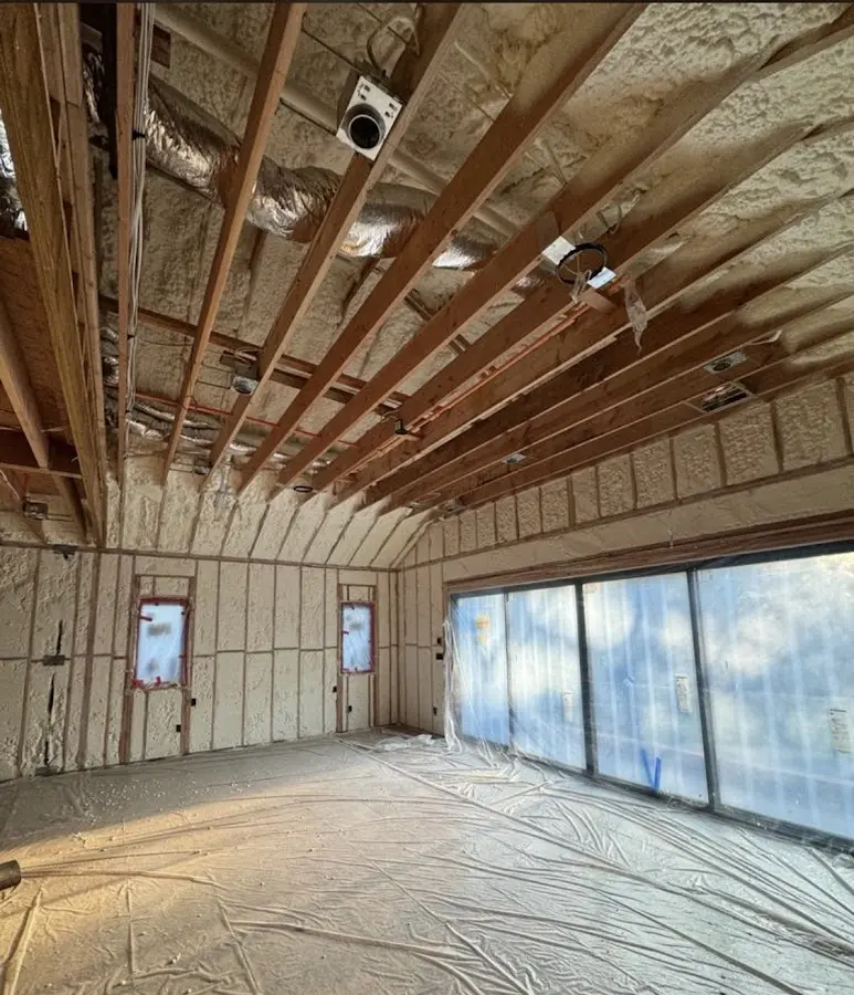 Interior walls and ceiling insulated with spray foam during new construction in Saratoga